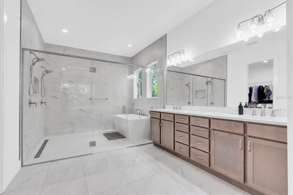 Bathroom, Dual Sink Vanities, Glass Shower, Interior, Marble, Marble Walls, Recessed Lighting