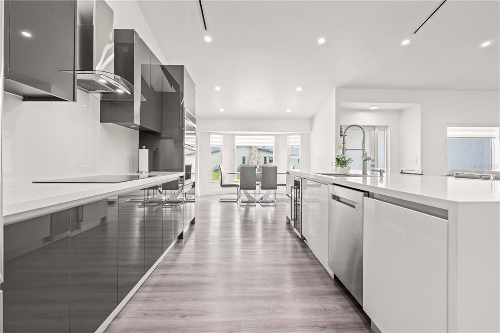 Dining room, Interior, Kitchen, Recessed Lighting, Stainless Steel Appliances, Wood Texture Flooring