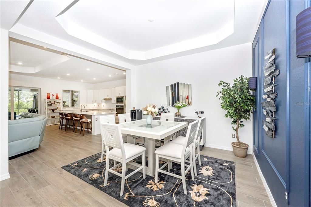 Dining room, Interior, Kitchen, Recessed Lighting, Stainless Steel Appliances, Wood Texture Flooring
