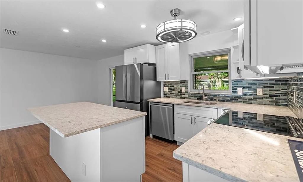 Interior, Kitchen, Pendant Lights, Recessed Lighting, Stainless Steel Appliances, Wood Texture Flooring