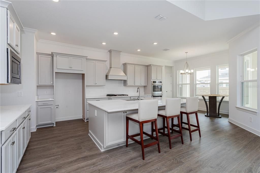 Chandelier, Interior, Kitchen, Recessed Lighting, Stainless Steel Appliances, Wood Texture Flooring