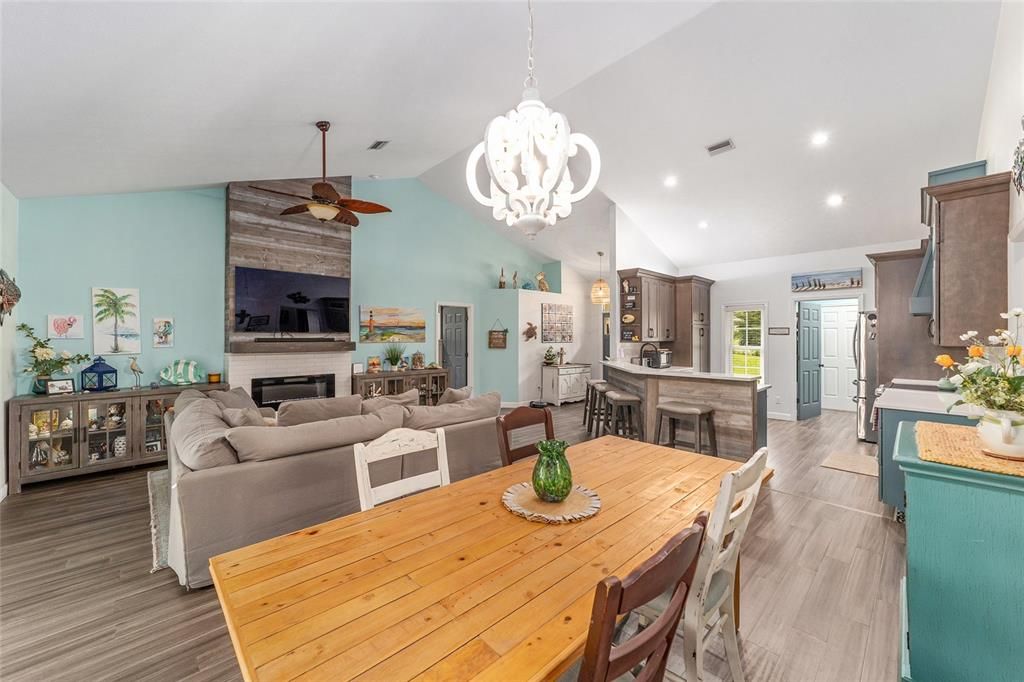 Chandelier, Dining room, Fireplace, Interior, Kitchen, Living room, Pendant Lights, Recessed Lighting, Wood Texture Flooring