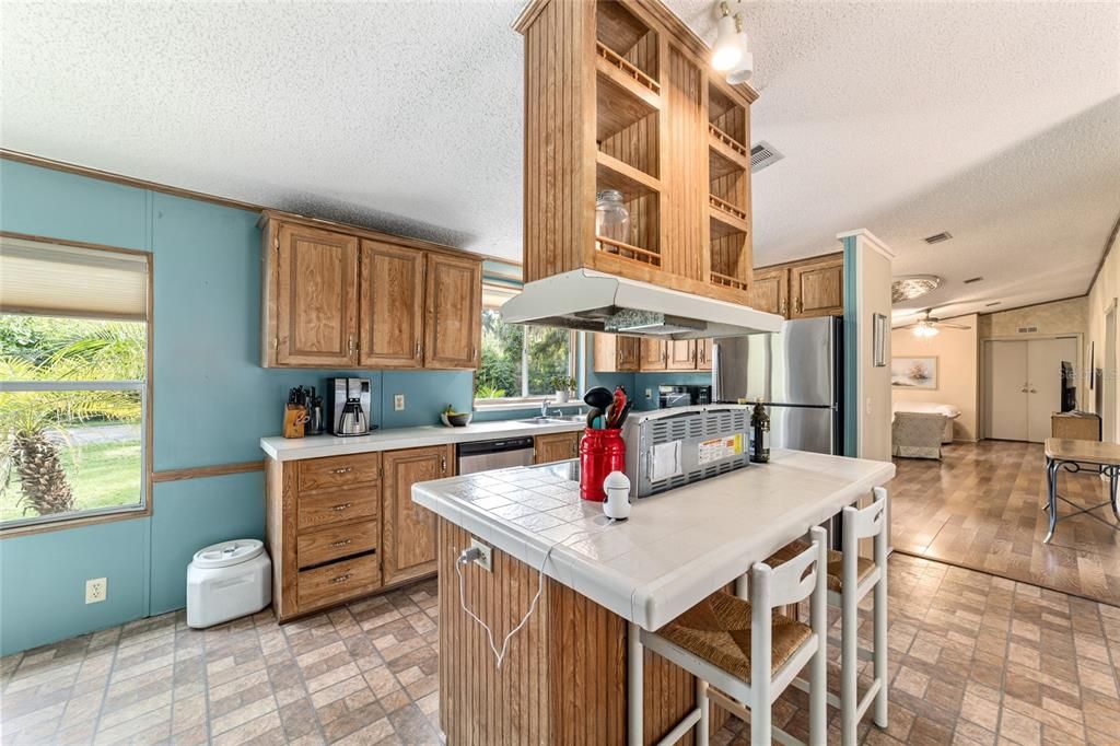 Interior, Kitchen, Tile Countertops, Wood Texture Flooring