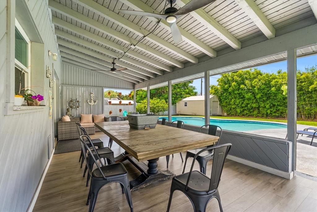 Dining room, Interior, Pool, Sun Room, Wood Texture Flooring
