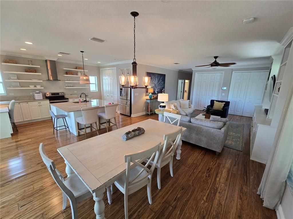Dining room, Interior, Kitchen, Living room, Pendant Lights, Recessed Lighting, Stainless Steel Appliances, Wood Texture Flooring
