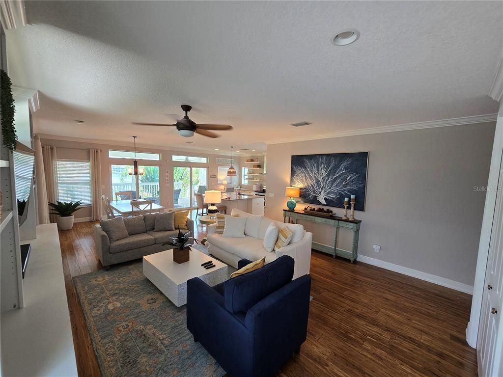 Dining room, Interior, Living room, Pendant Lights, Recessed Lighting, Water, Wood Texture Flooring