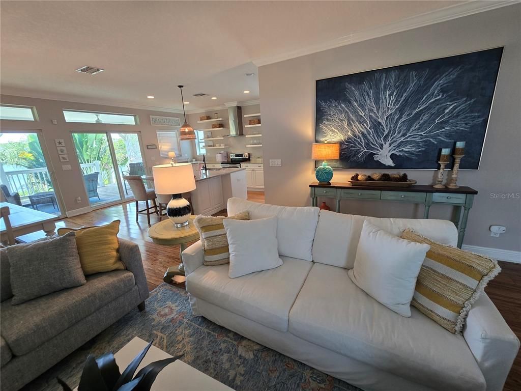 Dining room, Interior, Kitchen, Living room, Pendant Lights, Recessed Lighting, Stainless Steel Appliances, Wood Texture Flooring