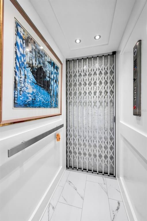 Elevator, Interior, Marble, Recessed Lighting