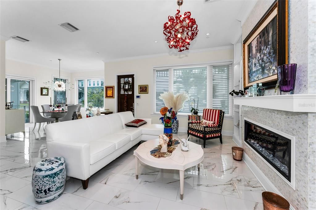 Dining room, Fireplace, Interior, Living room, Marble, Pendant Lights, Recessed Lighting