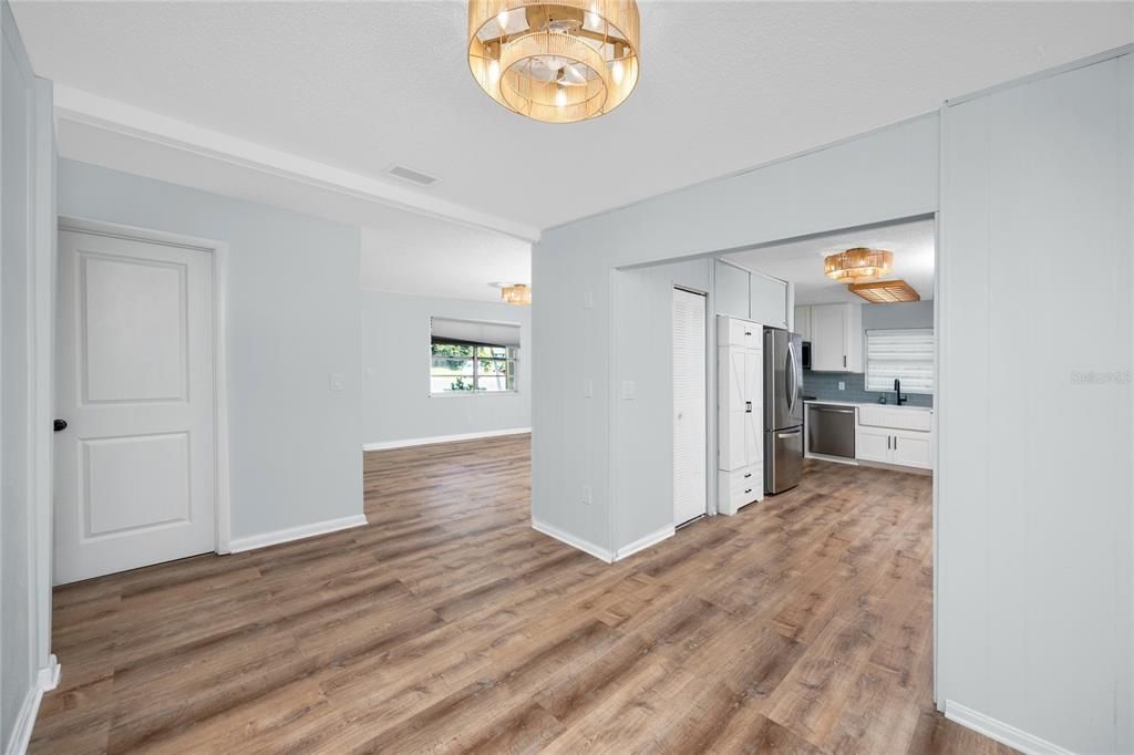 Empty room, Interior, Kitchen, Stainless Steel Appliances, Wood Texture Flooring