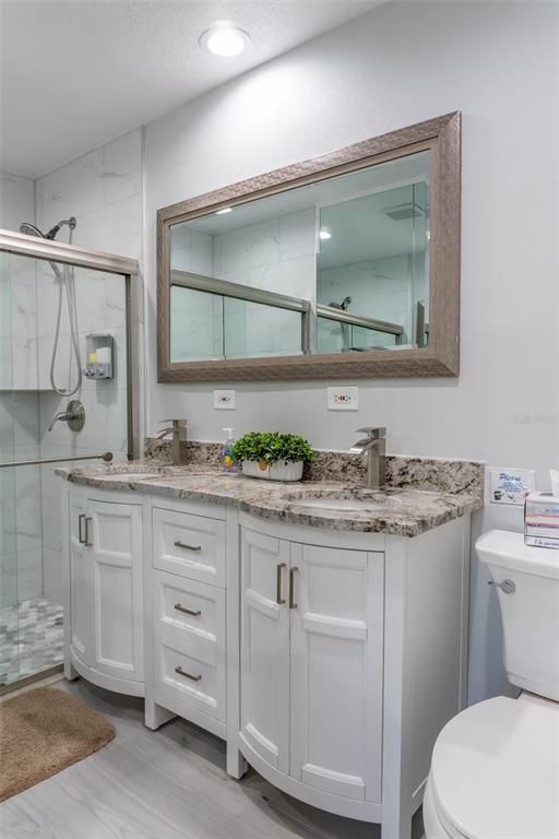 Bathroom, Dual Sink Vanities, Interior, Marble Walls, Recessed Lighting