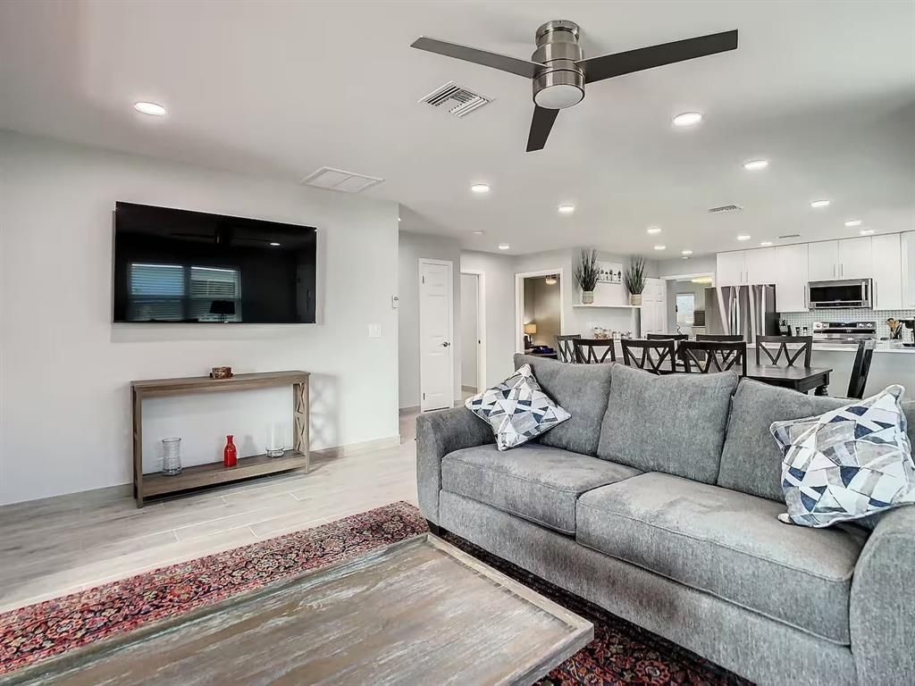 Dining room, Interior, Kitchen, Living room, Recessed Lighting, Stainless Steel Appliances, Wood Texture Flooring