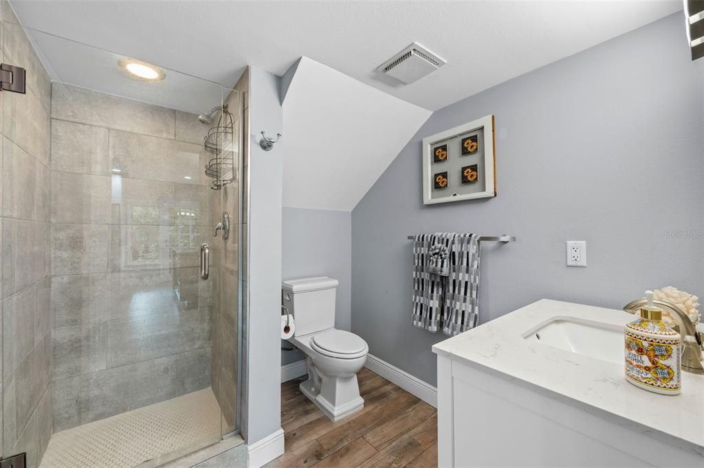 Bathroom, Glass Shower, Interior, Recessed Lighting, Wood Texture Flooring