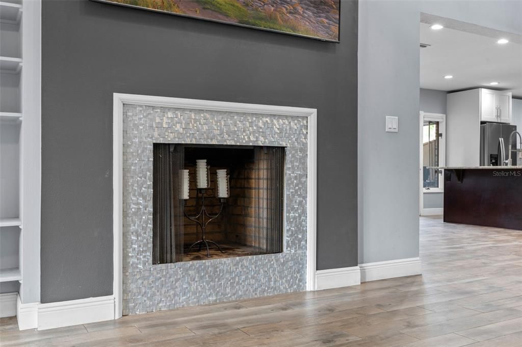 Fireplace, Interior, Recessed Lighting, Stainless Steel Appliances, Wood Texture Flooring