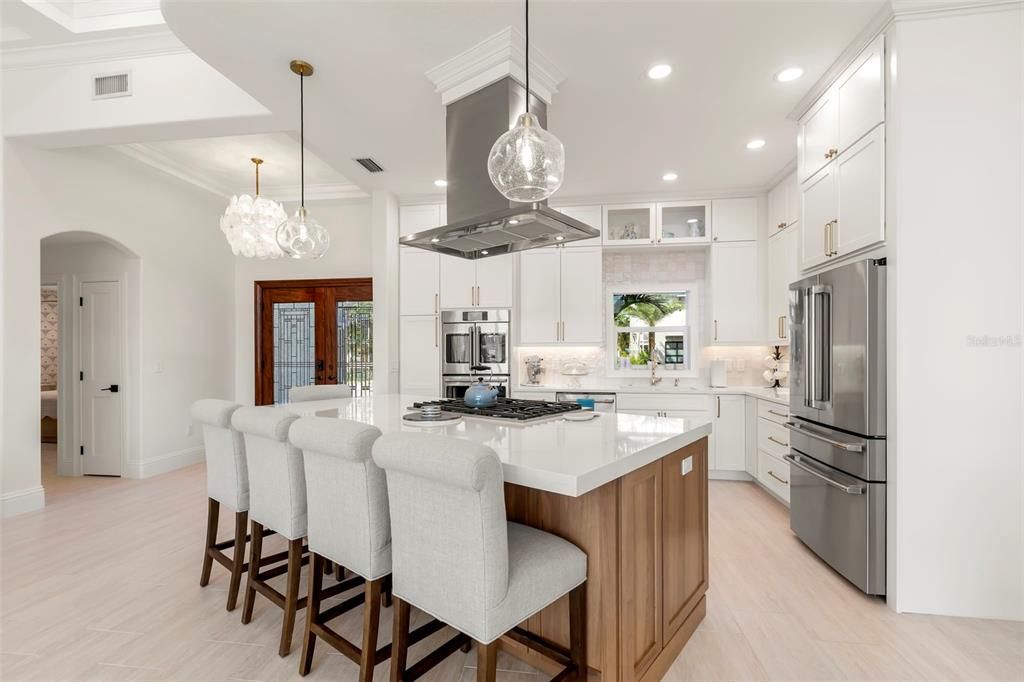 Chandelier, Interior, Kitchen, Pendant Lights, Recessed Lighting, Stainless Steel Appliances, Wood Texture Flooring