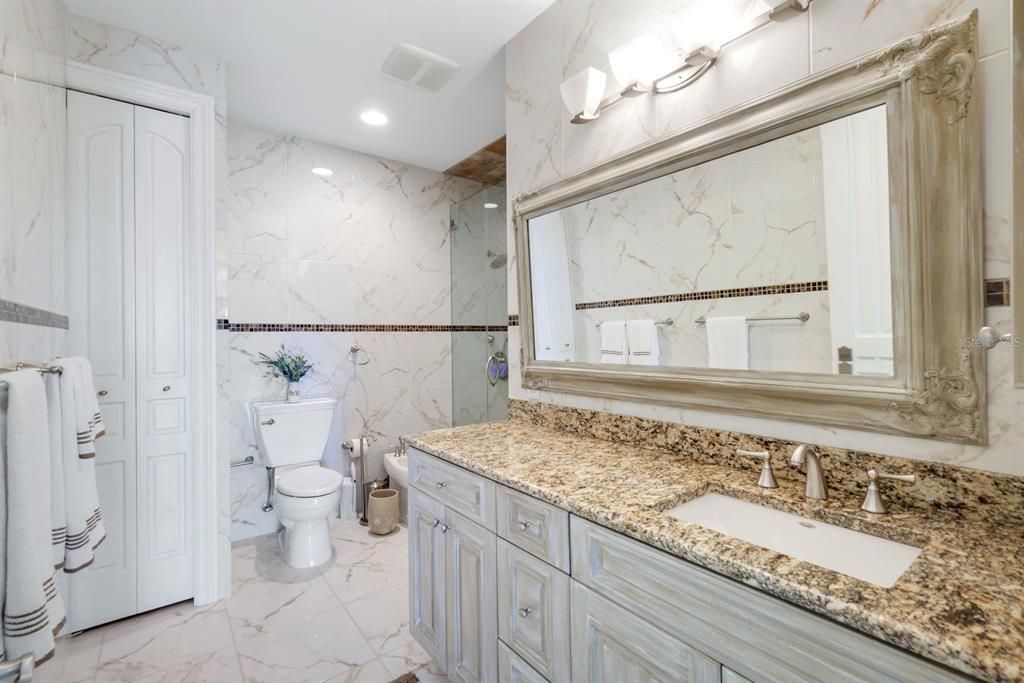 Bathroom, Dual Sink Vanities, Interior, Marble, Marble Walls, Recessed Lighting