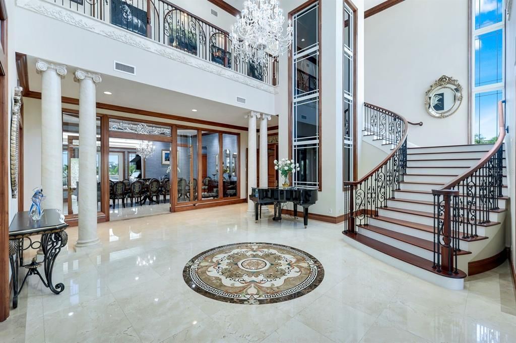 Chandelier, Dining room, Interior, Piano, Recessed Lighting