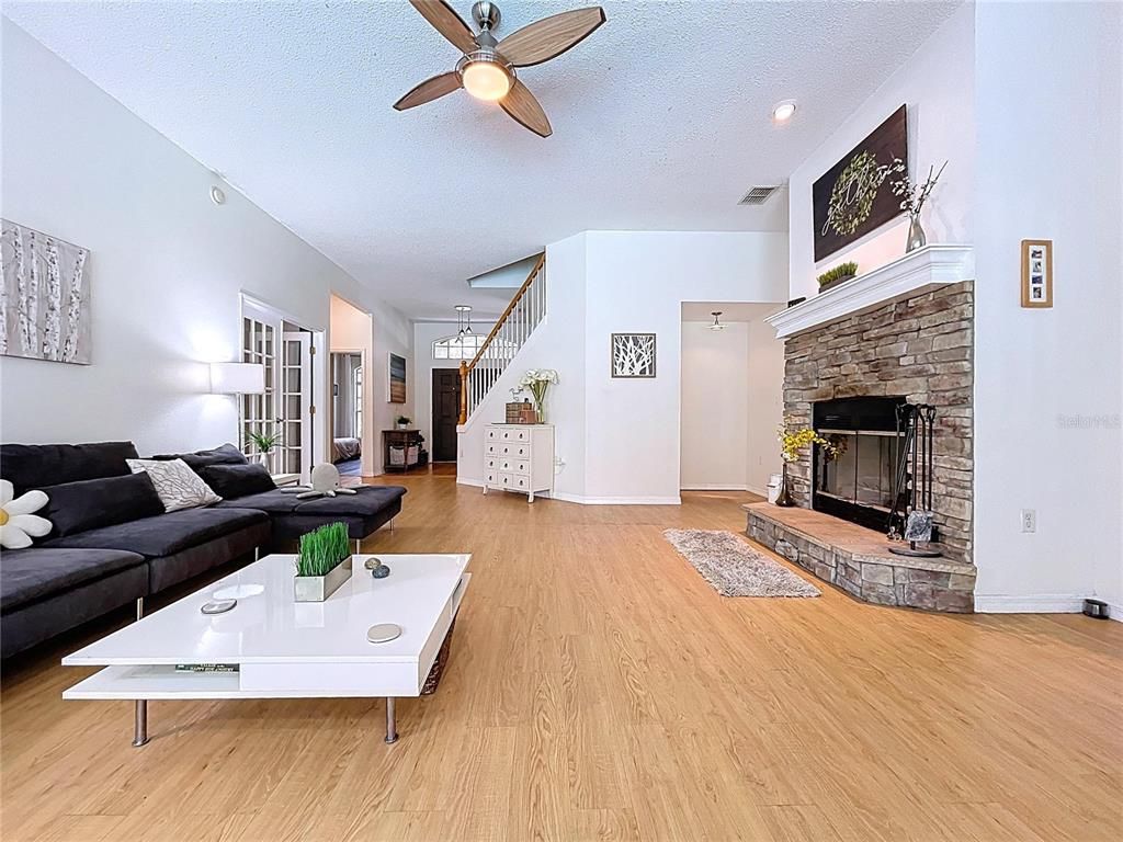 Fireplace, Interior, Living room, Recessed Lighting, Wood Texture Flooring