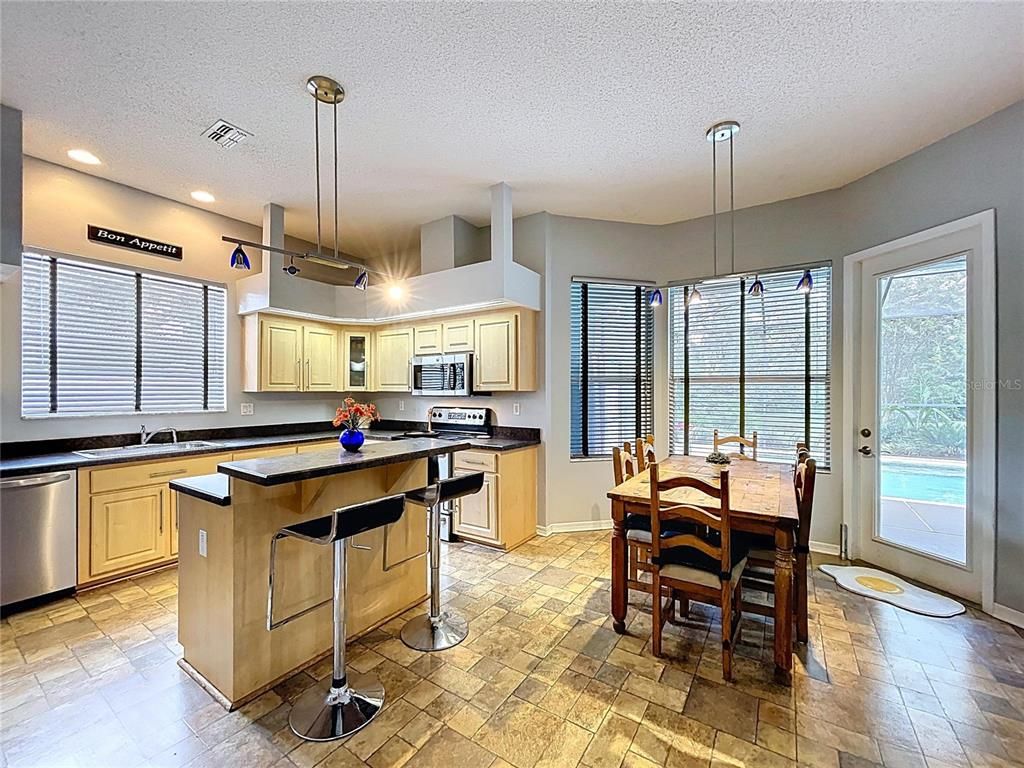 Dining room, Interior, Kitchen, Pendant Lights, Recessed Lighting, Stainless Steel Appliances
