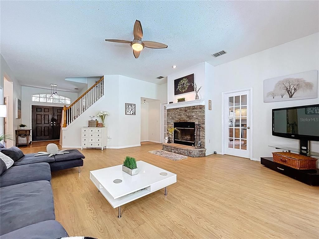 Fireplace, Interior, Living room, Recessed Lighting, Wood Texture Flooring