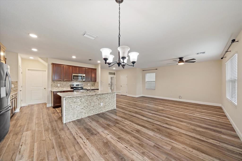 Chandelier, Interior, Kitchen, Recessed Lighting, Stainless Steel Appliances, Wood Texture Flooring