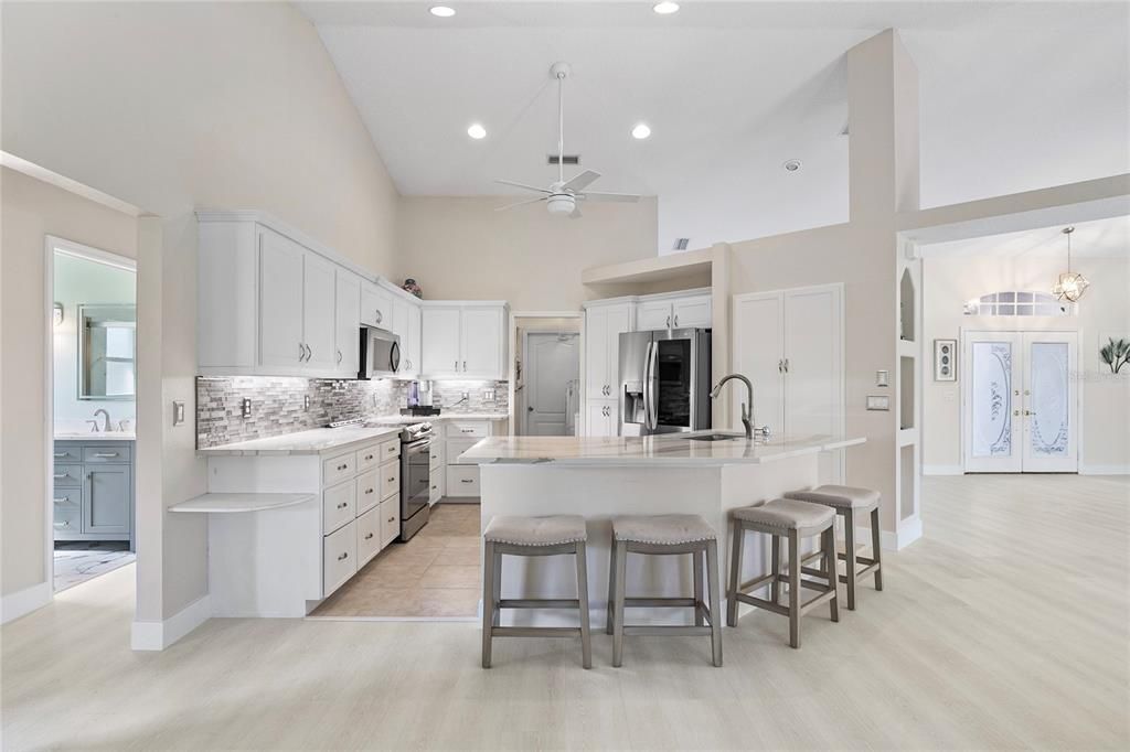 Chandelier, Interior, Kitchen, Pendant Lights, Recessed Lighting, Stainless Steel Appliances, Wood Texture Flooring