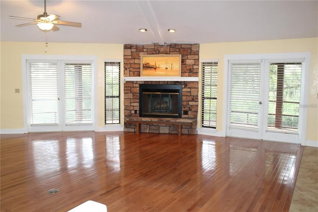 Empty room, Fireplace, Interior, Recessed Lighting, Wood Texture Flooring