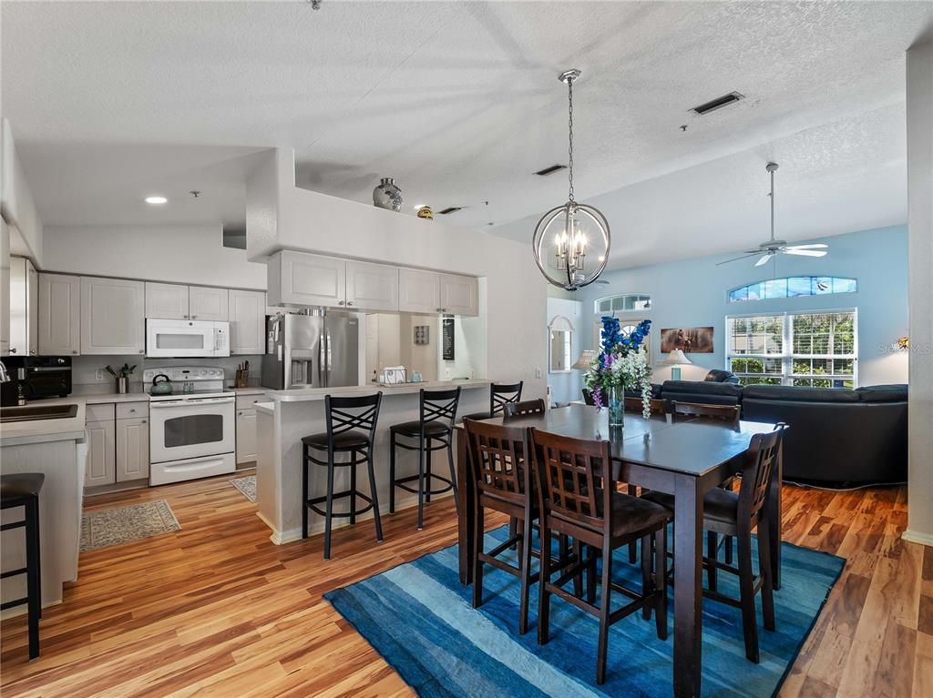 Dining room, Interior, Kitchen, Living room, Pendant Lights, Recessed Lighting, Stainless Steel Appliances, Wood Texture Flooring