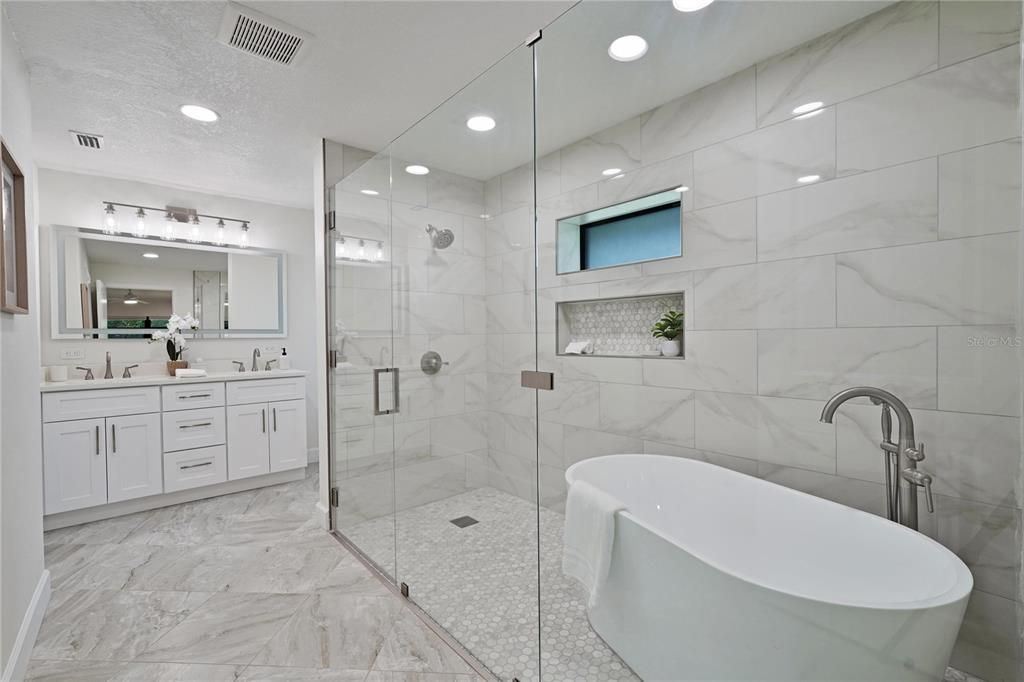Bathroom, Dual Sink Vanities, Free Standing Baths, Glass Shower, Interior, Marble, Marble Walls, Recessed Lighting