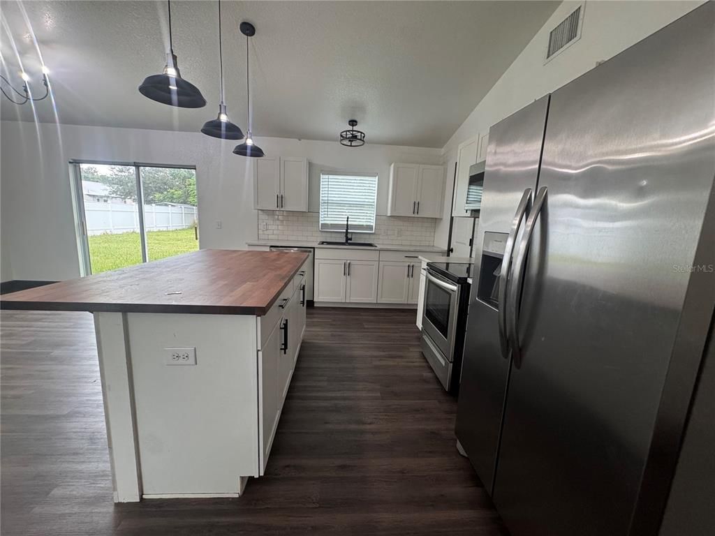 Interior, Kitchen, Pendant Lights, Stainless Steel Appliances, Wood Texture Flooring