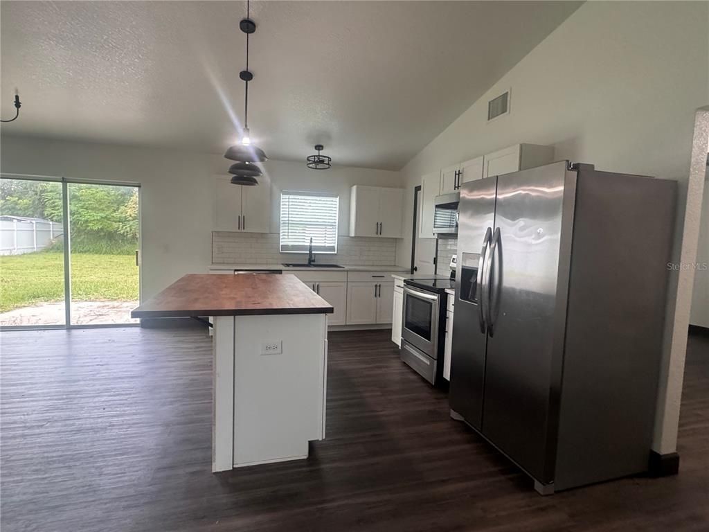 Interior, Kitchen, Pendant Lights, Stainless Steel Appliances, Wood Texture Flooring