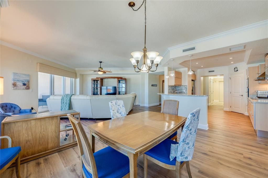 Chandelier, Dining room, Interior, Kitchen, Living room, Pendant Lights, Recessed Lighting, Wood Texture Flooring