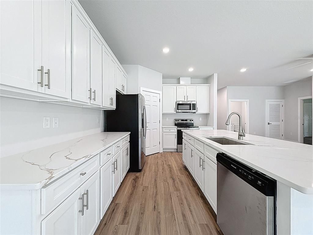 Interior, Kitchen, Recessed Lighting, Stainless Steel Appliances, Wood Texture Flooring