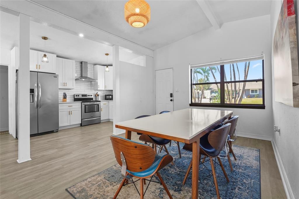 Dining room, Interior, Kitchen, Pendant Lights, Recessed Lighting, Stainless Steel Appliances, Wood Texture Flooring