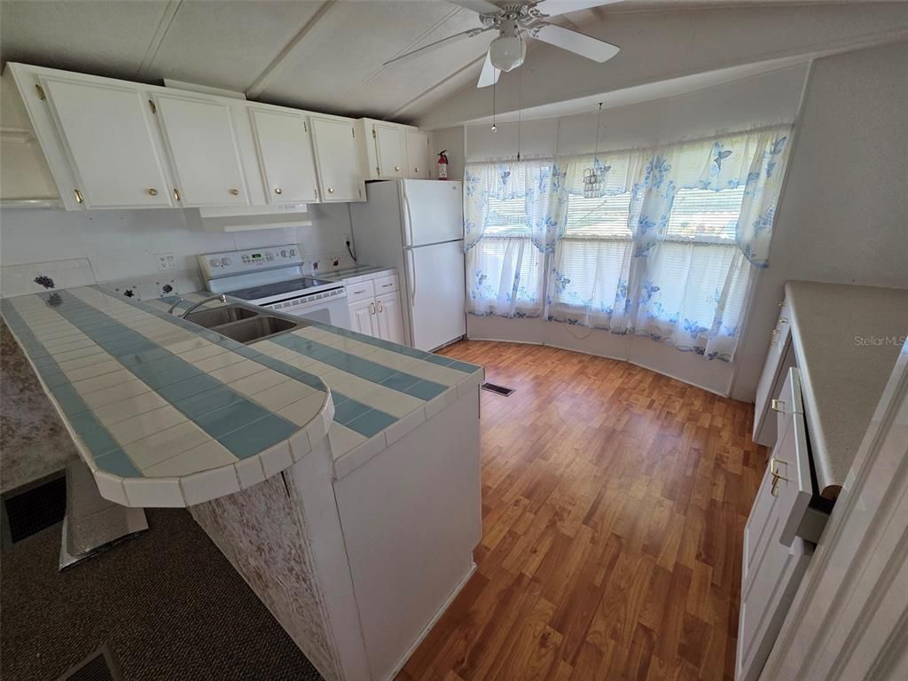 Interior, Kitchen, Tile Countertops, Wood Texture Flooring