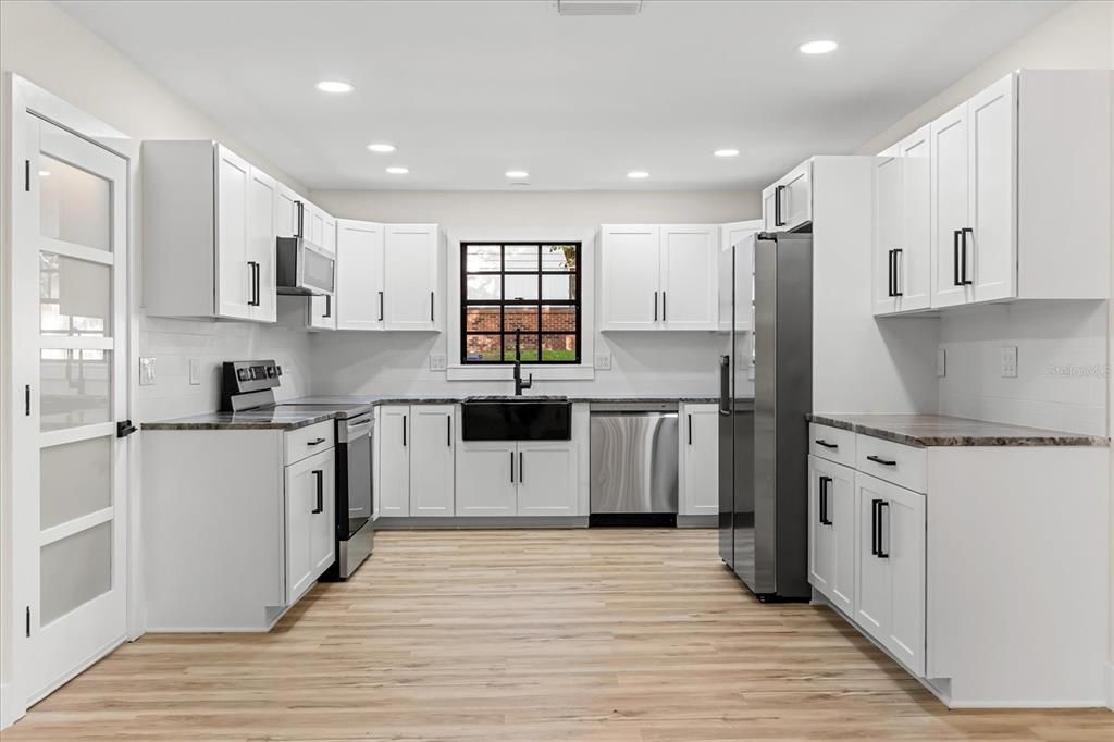 Interior, Kitchen, Recessed Lighting, Stainless Steel Appliances, Wood Texture Flooring