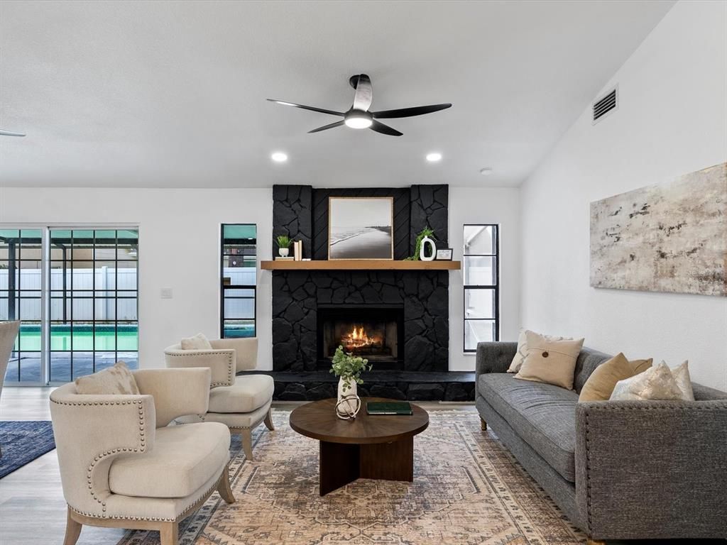 Fireplace, Interior, Living room, Recessed Lighting, Wood Texture Flooring