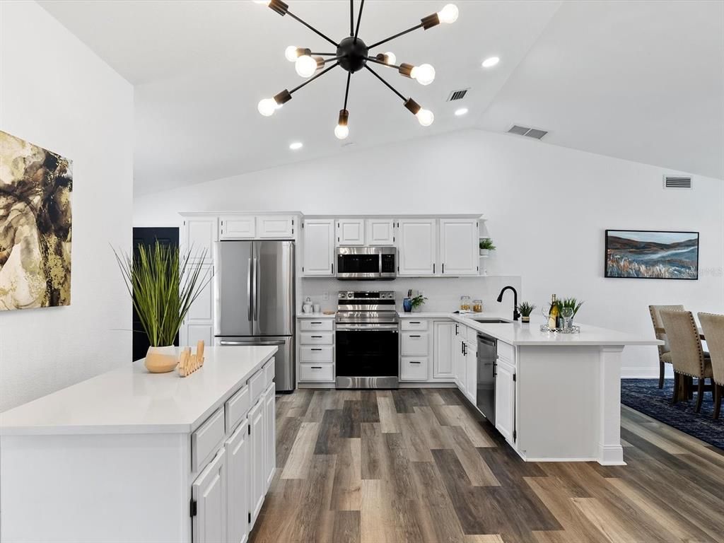Interior, Kitchen, Pendant Lights, Recessed Lighting, Stainless Steel Appliances, Wood Texture Flooring