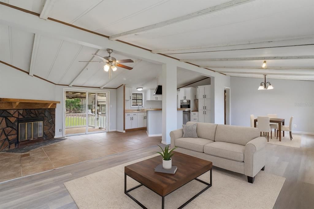Dining room, Fireplace, Interior, Kitchen, Living room, Pendant Lights, Wood Texture Flooring