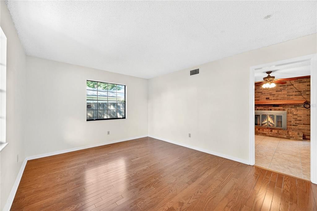 Empty room, Fireplace, Interior, Stone Walls, Wood Texture Flooring
