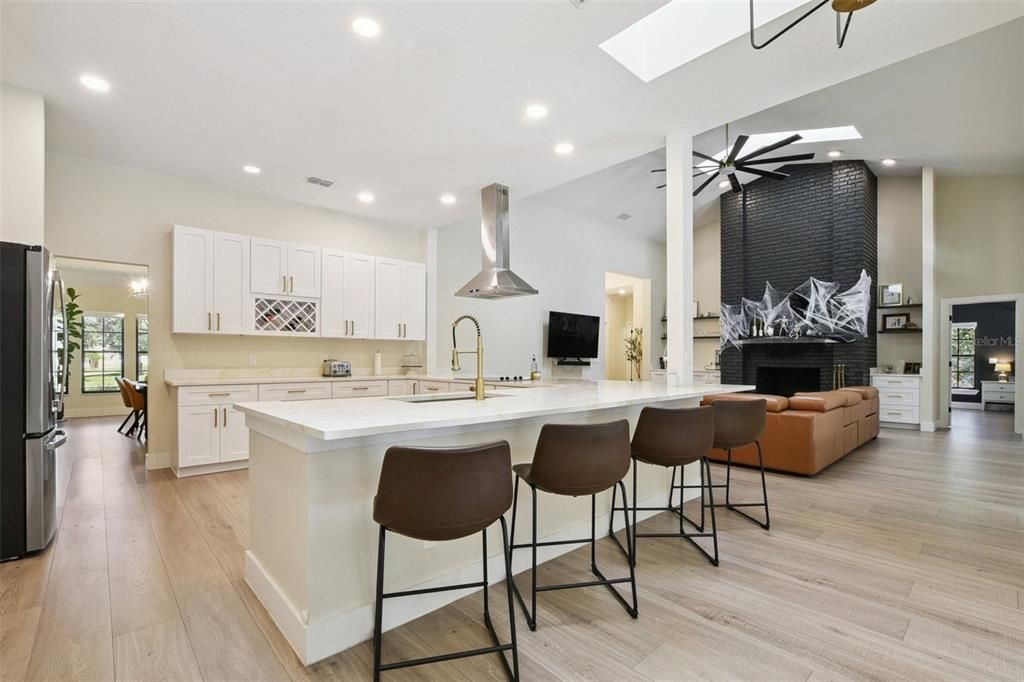 Fireplace, Interior, Kitchen, Recessed Lighting, Wood Texture Flooring