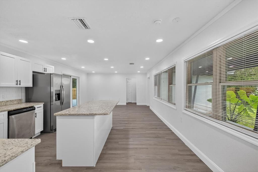 Interior, Kitchen, Recessed Lighting, Stainless Steel Appliances, Wood Texture Flooring