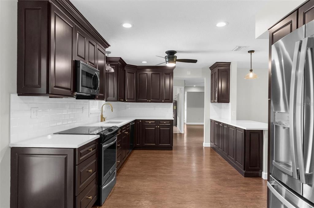 Interior, Kitchen, Pendant Lights, Recessed Lighting, Stainless Steel Appliances, Wood Texture Flooring