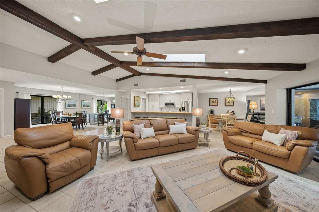 Chandelier, Dining room, Interior, Kitchen, Living room, Pendant Lights, Recessed Lighting, Stainless Steel Appliances, Wooden Beams
