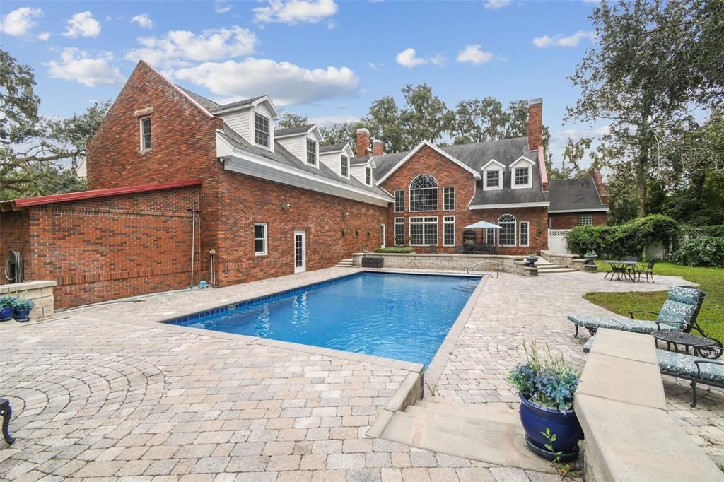 Exterior, Facade, Brick Facade, Pool, Tudor Revival