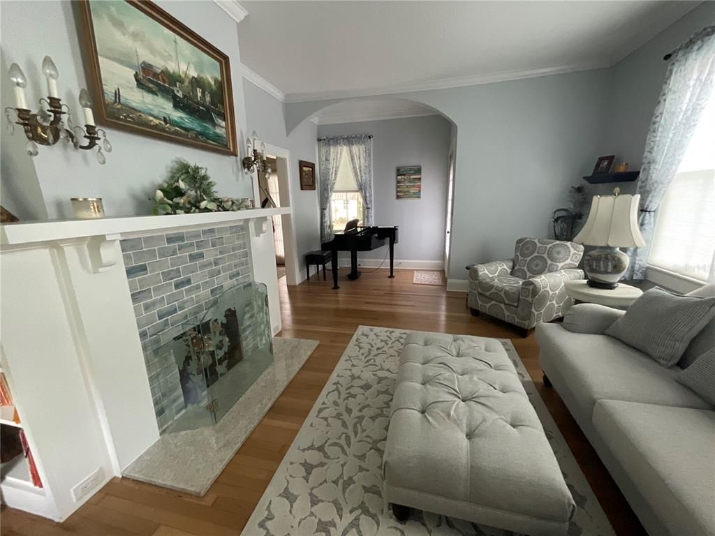 Fireplace, Interior, Living room, Piano, Wood Texture Flooring