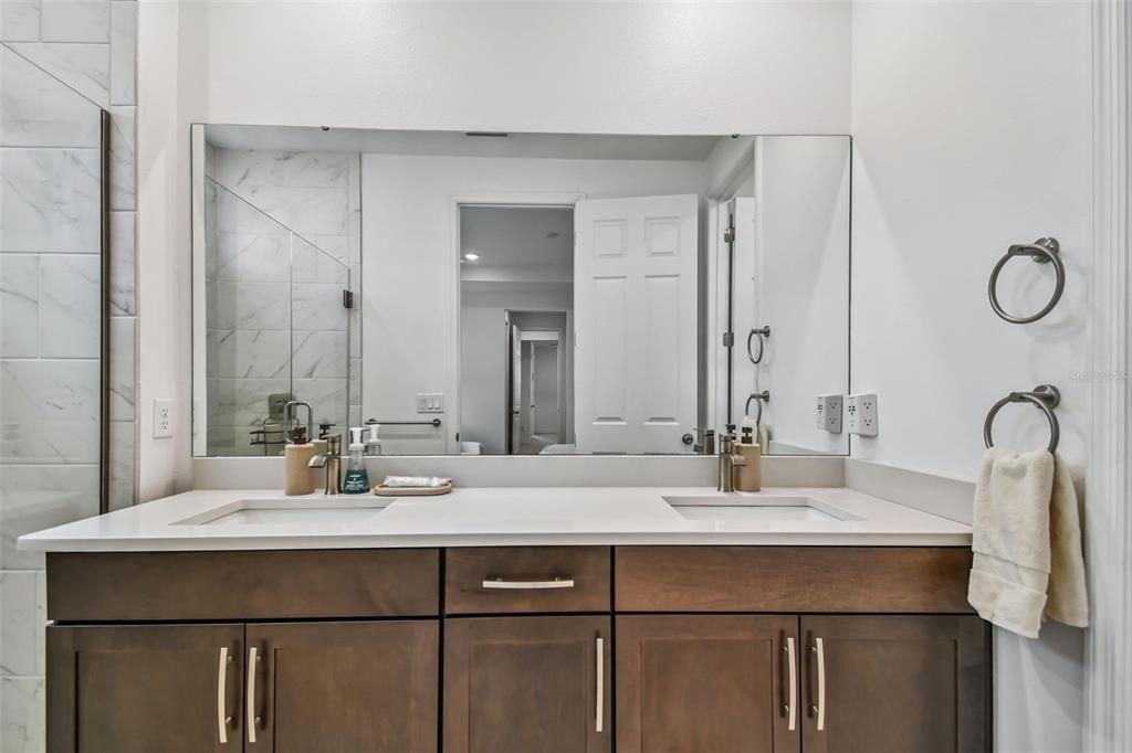 Bathroom, Dual Sink Vanities, Interior, Marble Walls, Recessed Lighting