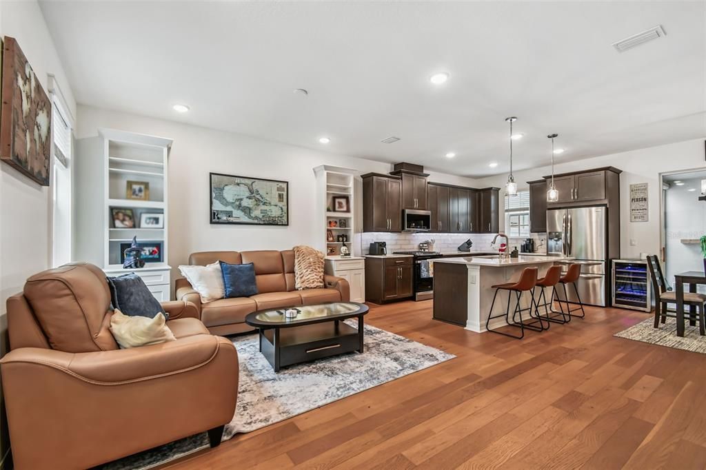 Dining room, Interior, Kitchen, Living room, Pendant Lights, Recessed Lighting, Stainless Steel Appliances, Wood Texture Flooring