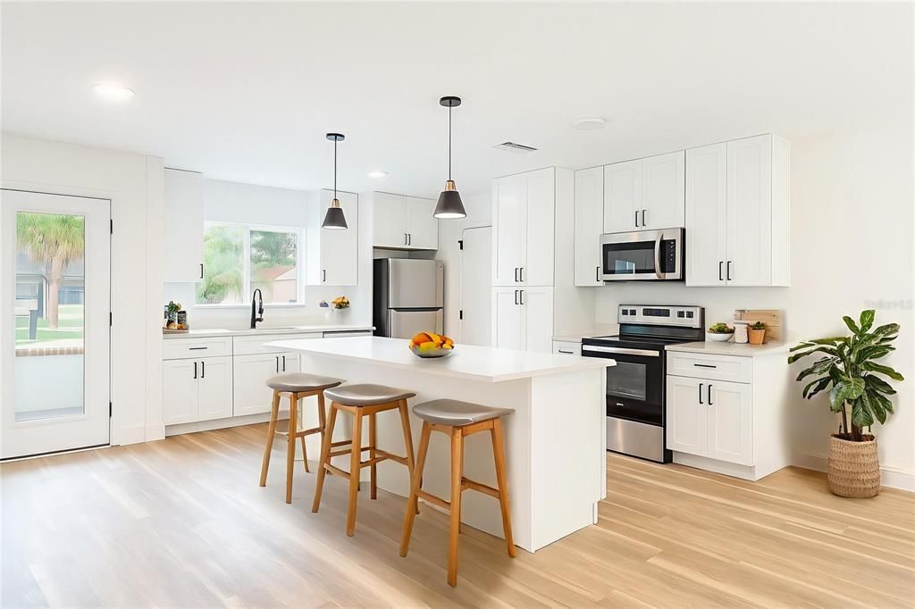Interior, Kitchen, Pendant Lights, Recessed Lighting, Stainless Steel Appliances, Wood Texture Flooring