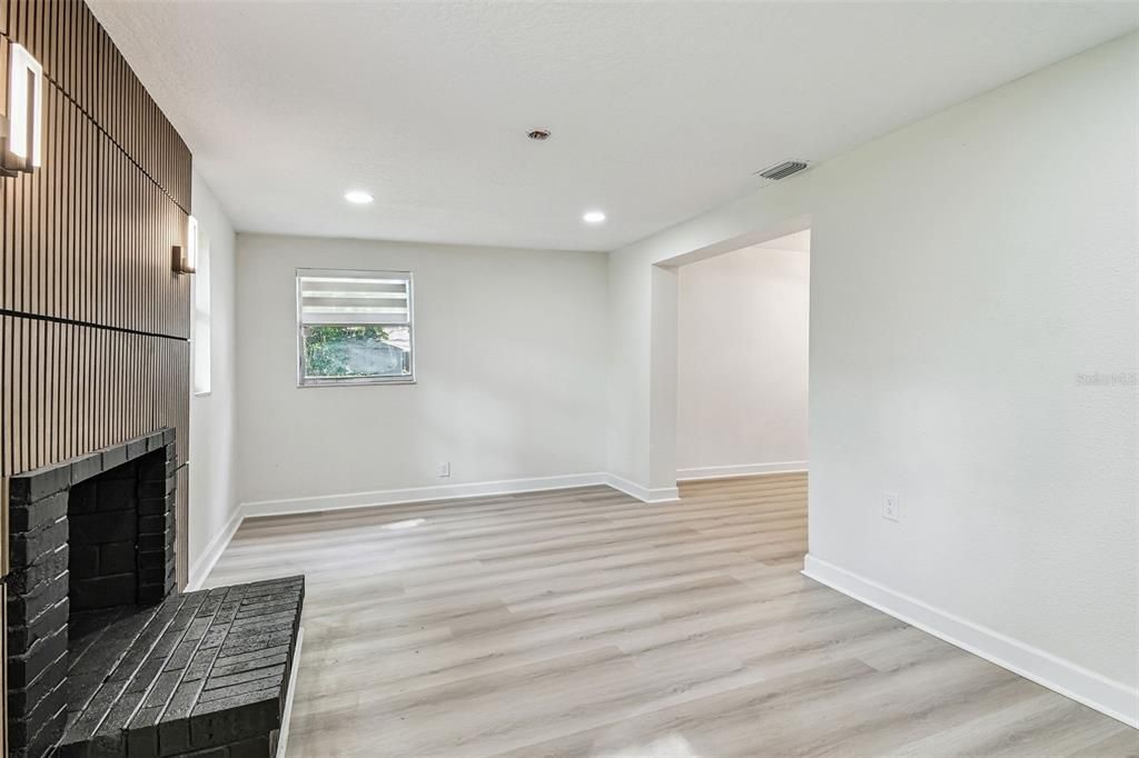 Empty room, Fireplace, Interior, Recessed Lighting, Wood Texture Flooring
